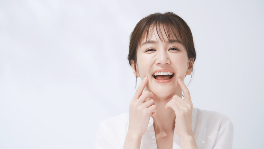 根管治療をした笑顔の女性